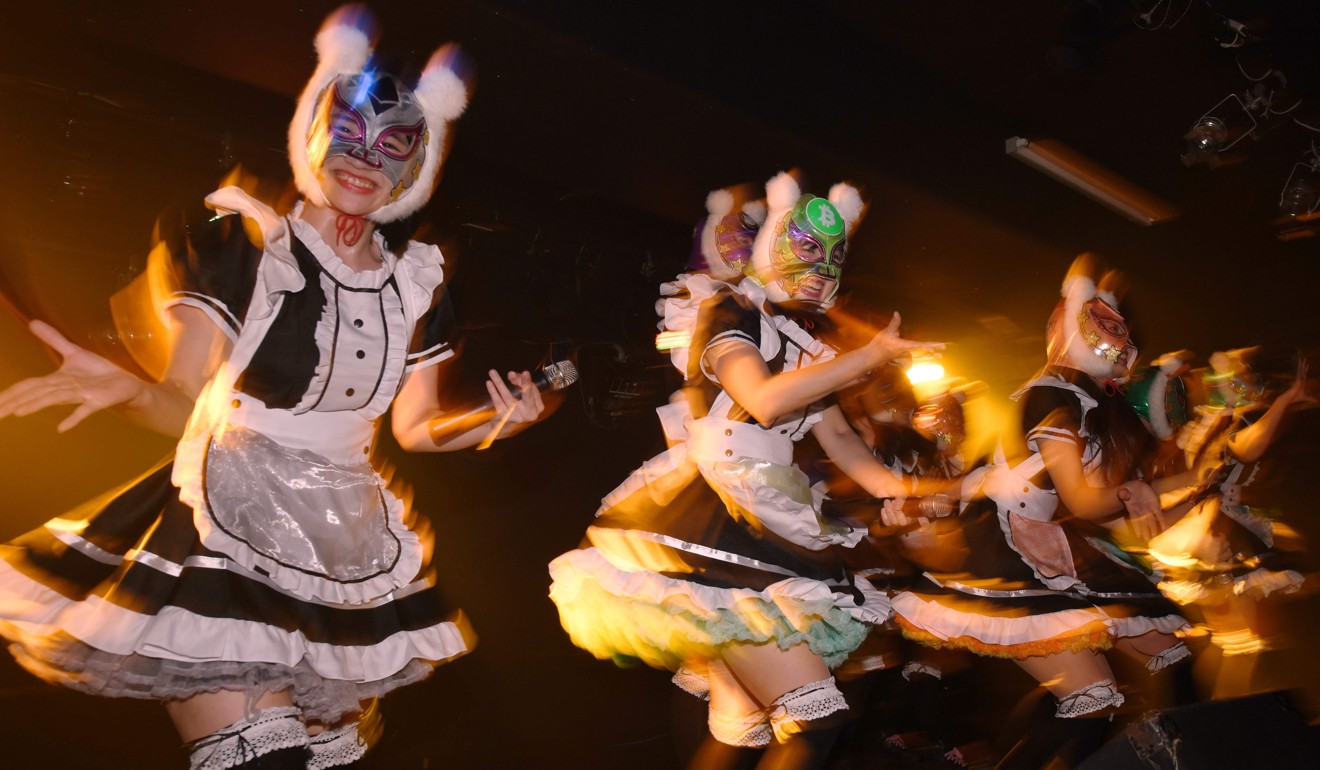 Cryptocurrency mania gripped the world in recent months. Here, the Japanese all-girl pop group called the Virtual Currency Girls perform in Tokyo on January 12. Photo: AFP