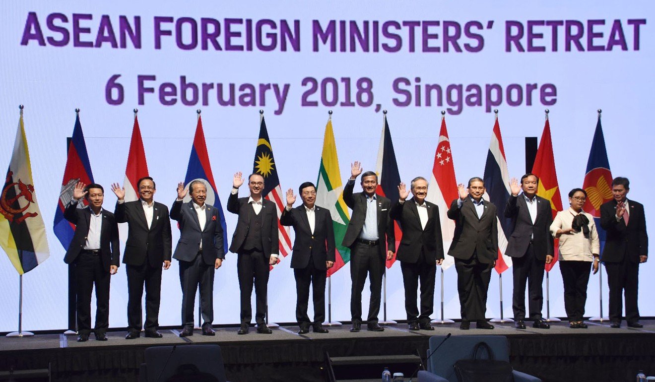 Asean foreign ministers pose for a photograph at their retreat in Singapore on Tuesday. Photo: Kyodo