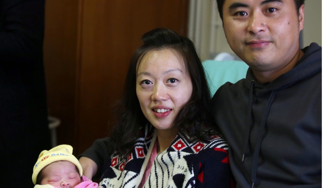 Mr and Mrs Choi with their baby daughter – their second child – at Prince Wales Hospital. Photo: Xiaomei Chen