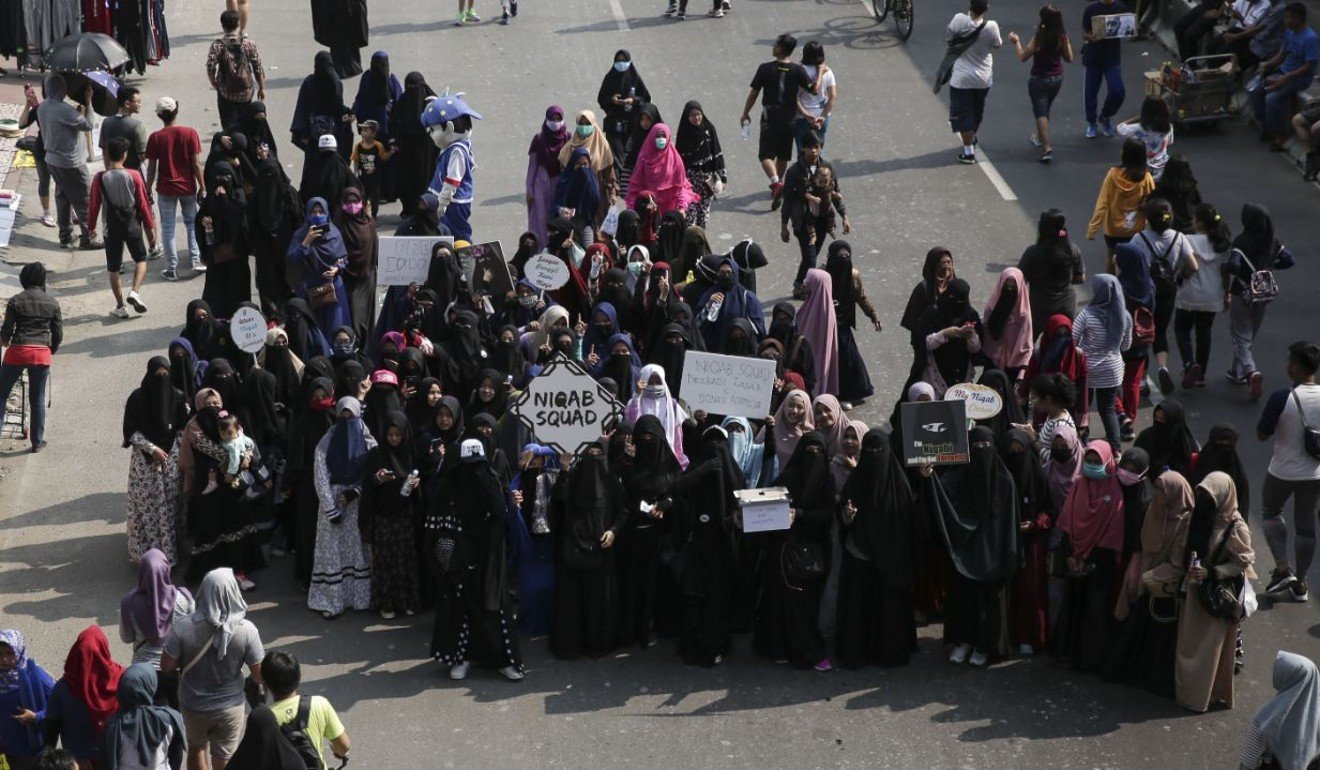 Niqab Squad members raise awareness about the veil wearing community in Jakarta, Indonesia. Photo: Niqab Squad