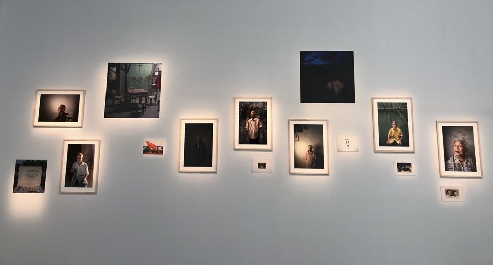 Sim Chi Yin’s “One Day We'll Understand” multimedia project includes portraits of former deportees being shown with photographs taken at sites related to the Malayan Emergency. Photo: Enid Tsui
