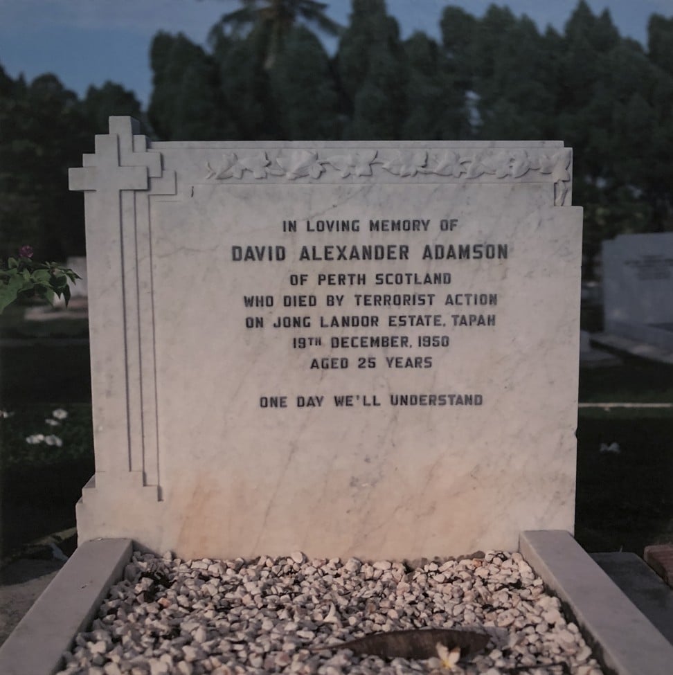 The grave of David Alexander Adamson, a Briton killed in 1950 by Communist insurgents at his Malayan rubber plantation. The photo is part of Sim Chi Yin’s “One Day We'll Understand” display in Singapore. Photo: Enid Tsui
