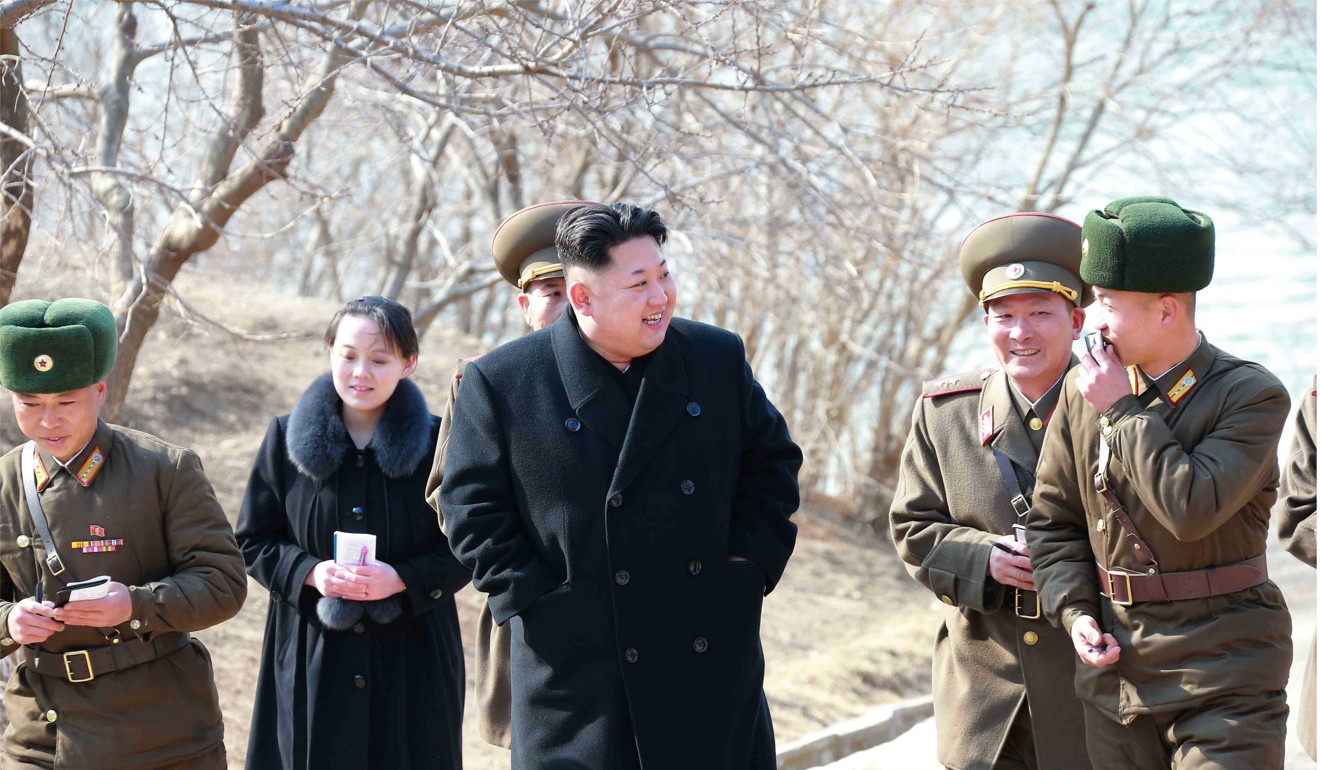 Developing a nuclear arsenal capable of reaching most of the US is the priority of North Korean leader Kim Jong-un (centre). Photo: EPA