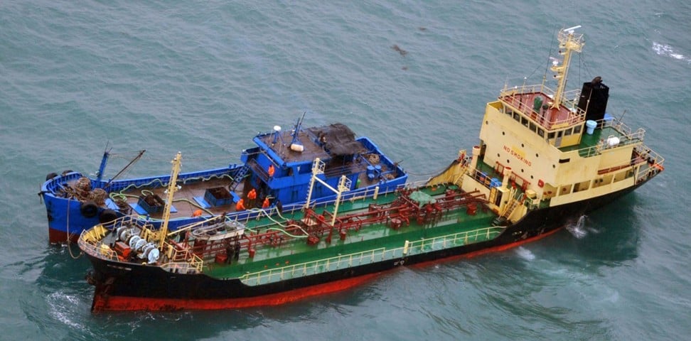 China’s foreign ministry said it would investigate an alleged ship-to-ship transfer that might have violated UN sanctions on North Korea following the release by Japan’s Ministry of Defence of this image showing what it said was a North Korean-flagged tanker Yu Jong 2, bottom, and Min Ning De You 078 lying alongside in the East China Sea. Photo: AP