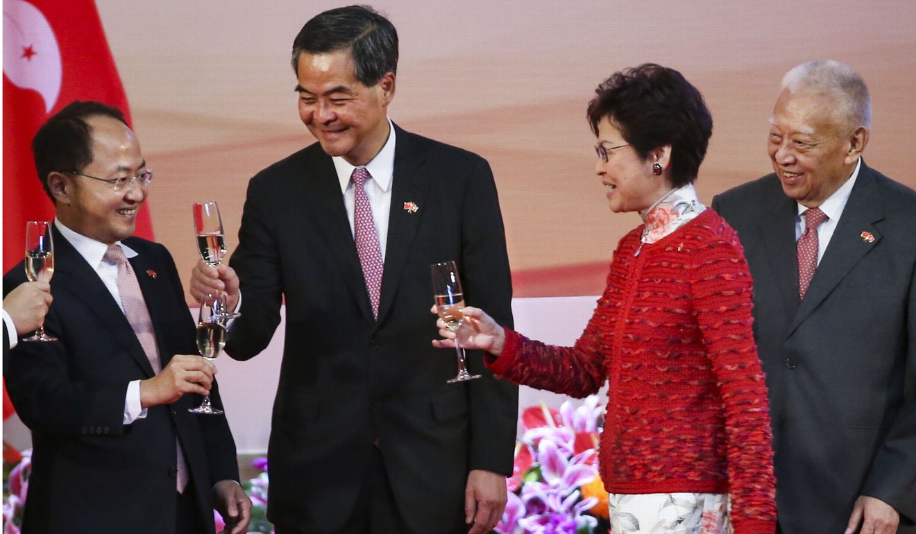 The director of the central government’s liaison office Wang Zhimin (far left) toasts with local officials, including Chief Executive Carrie Lam, during the National Day Reception in October. Photo: K. Y. Cheng