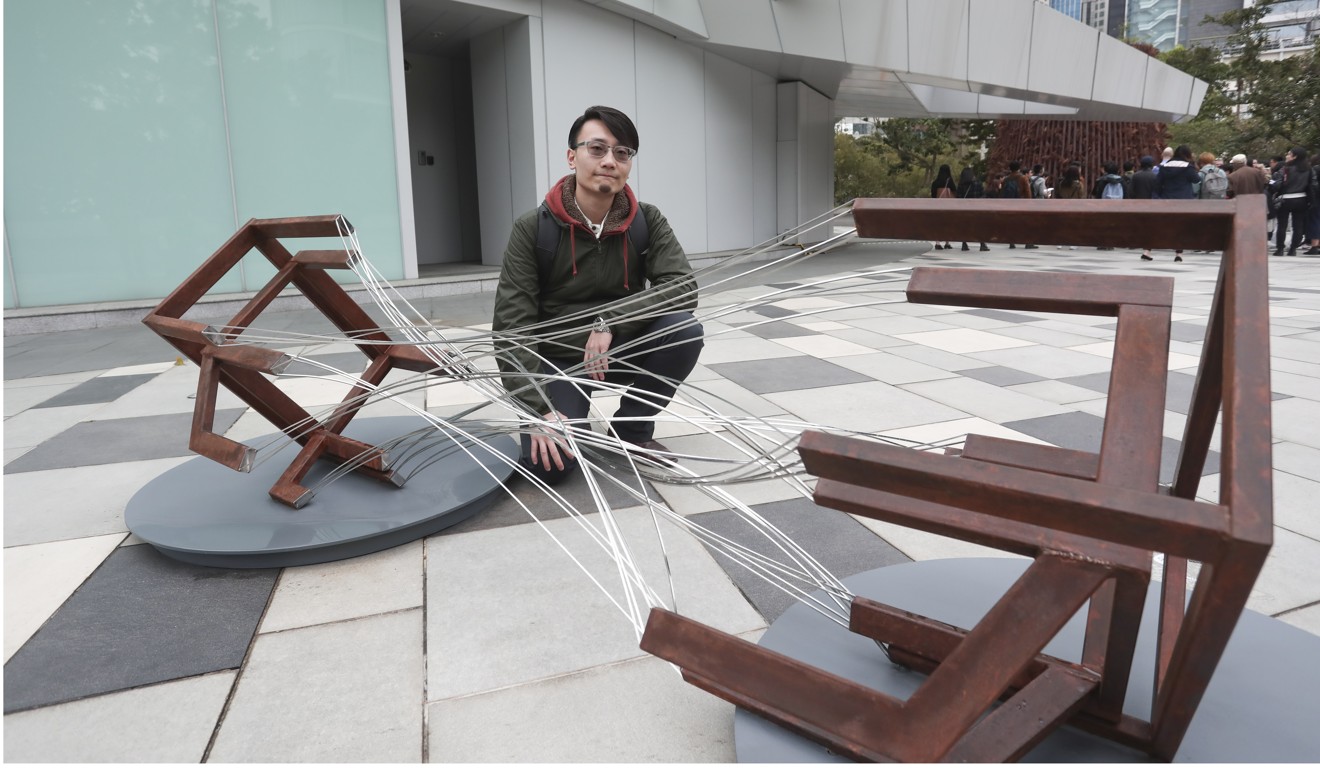 Hong Kong artist Ho Kwun-ting with his contribution. Photo: Jonathan Wong