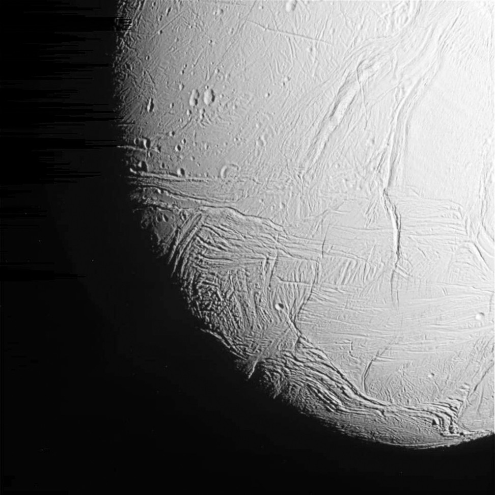 In this untreated 2015 photo by the Cassini spacecraft, Enceladus’s icy surface can be seen. Photo: Nasa via AFP