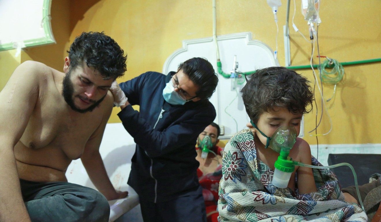 Syrian children and adults receive treatment for a suspected chemical attack at a makeshift clinic on the rebel-held village of al-Shifuniyah in the Eastern Ghouta region on the outskirts of the capital Damascus on February 25. Photo: AFP