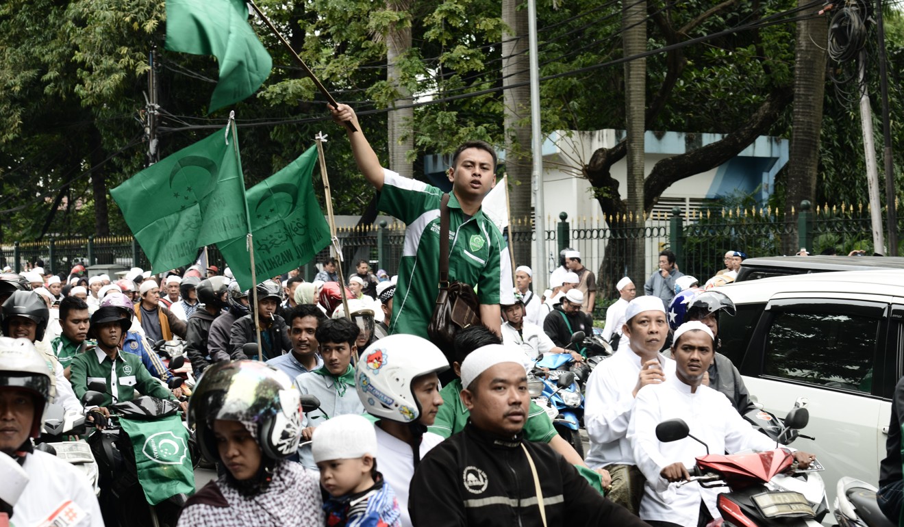 Thousands of Indonesians march in protest against Jakarta governor Basuki Purnama in 2016. Photo: AFP