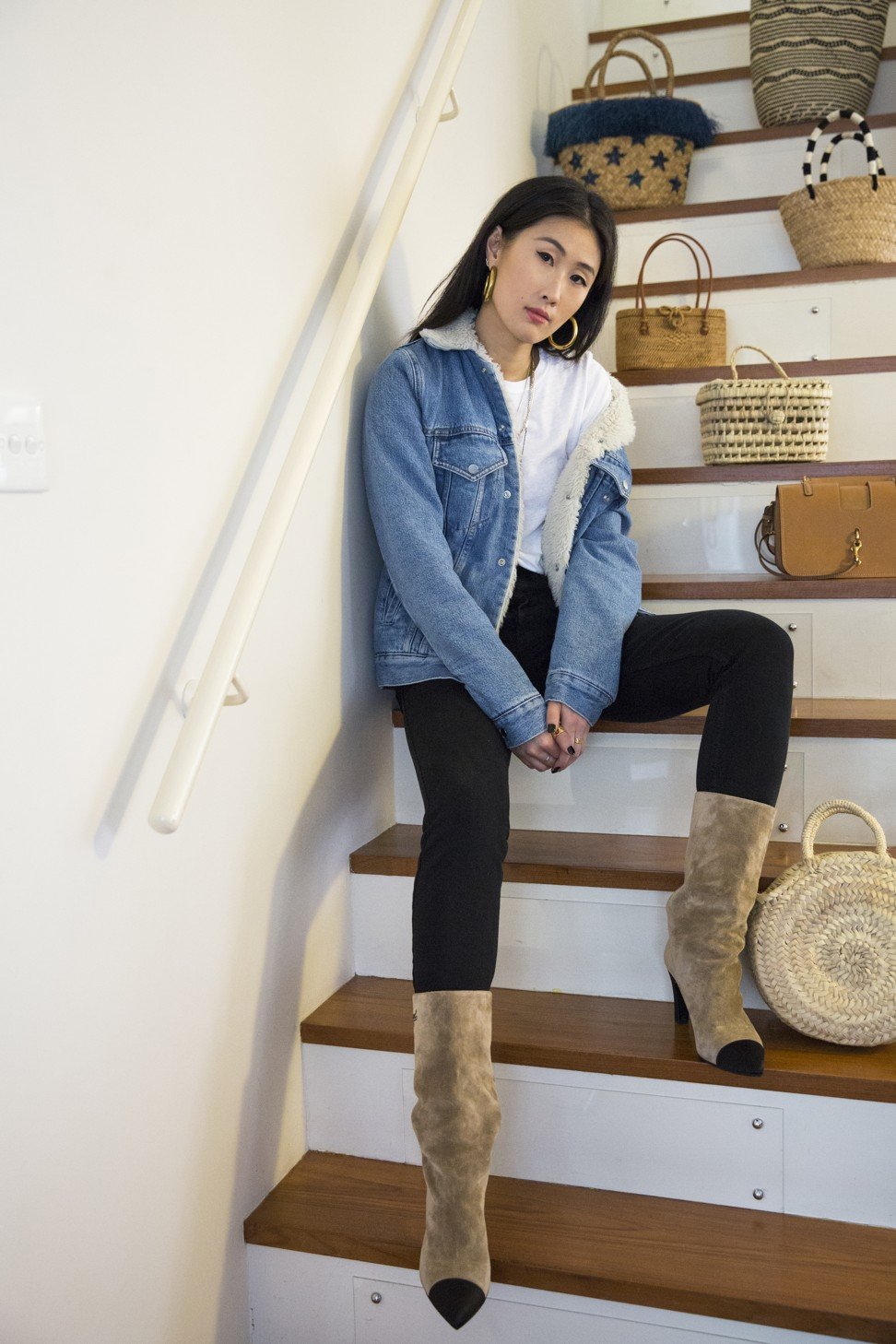 Jacket by Sandro, boots by Chanel, jeans by Frame Denim, T-shirt by ReDone. Photo: Michelle Wong