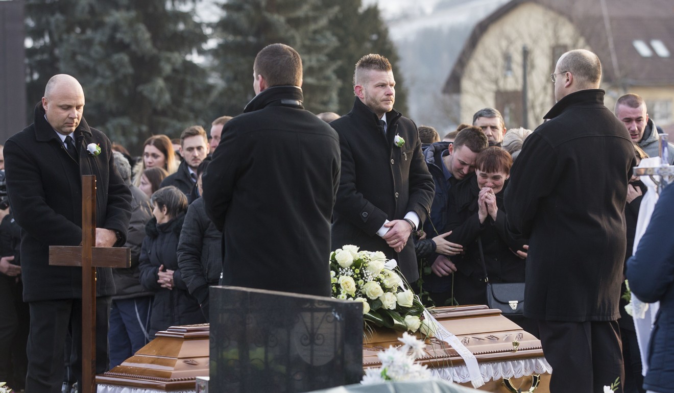 Relatives and friends attend the funeral of investigative journalist Jan Kuciak who was shot dead in Slovakia last week while working on a story about the activities of the Italian mafia in his country and their links to people close to Prime Minister Robert Fico. Photo: AP