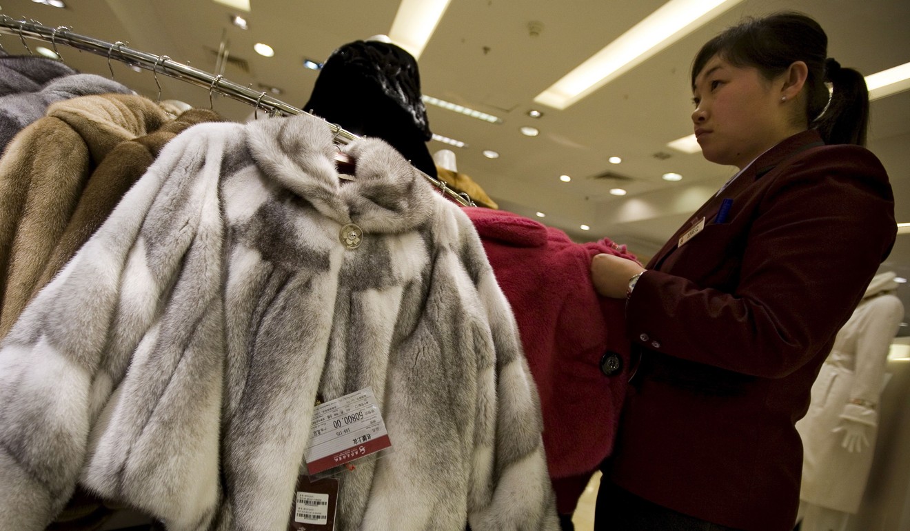 Mink coats for sale at a high-end shopping mall in Beijing. Chinese consumers may account for as much as 90 per cent of the fur garments bought worldwide. Photo: Diego Azubel/EPA/REX/Shutterstock