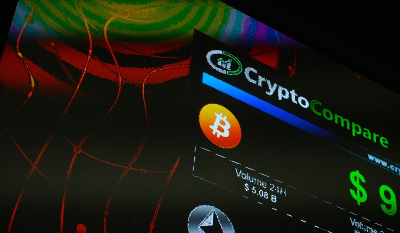 The symbols of Bitcoin and Ethereum cryptocurrencies sit displayed on a screen during the Crypto Investor Show in London, on March 10, 2018. Photo: Bloomberg