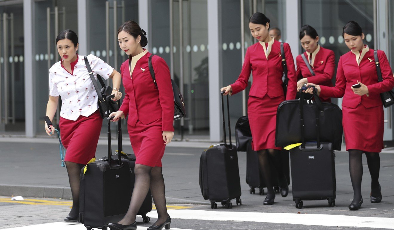 Time to change air hostesses' old-fashioned image, says ...