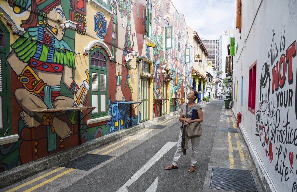 Graffiti on buildings in Singapore’s Haji Lane, in the Kampong Glam neighbourhood famous for its cafes, restaurants and shops.