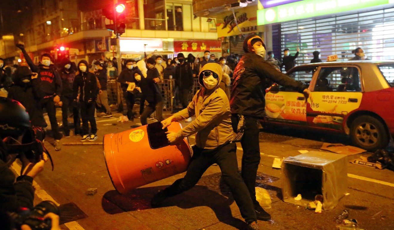 Protesters clash with police in Mong Kok. Photo: Edward Wong