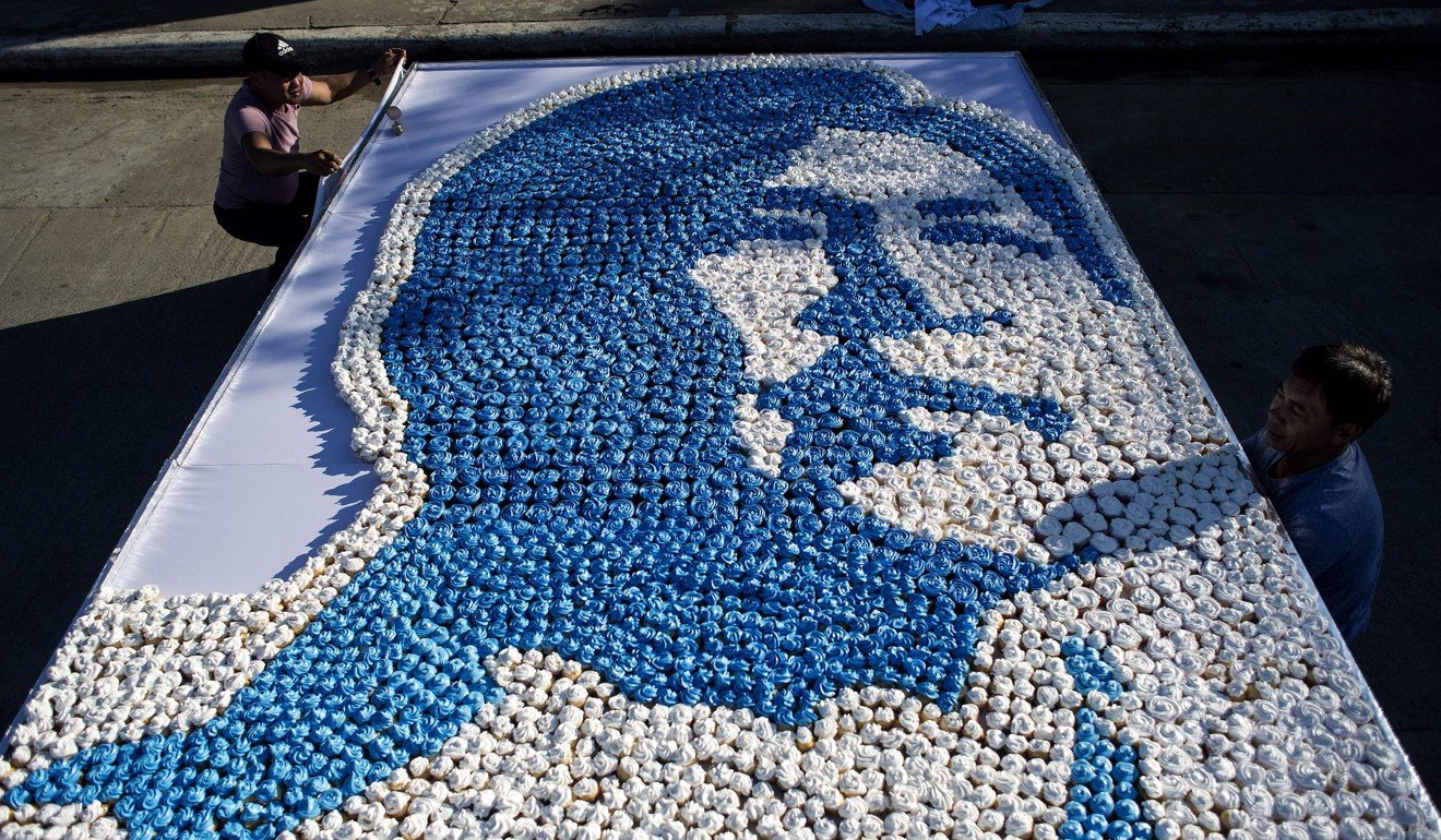An image of the late dictator Ferdinand Marcos made out of cupcakes in Ilocos Norte. The image was made as part of celebrations to mark the dictator’s 100th birthday. Photo: AFP
