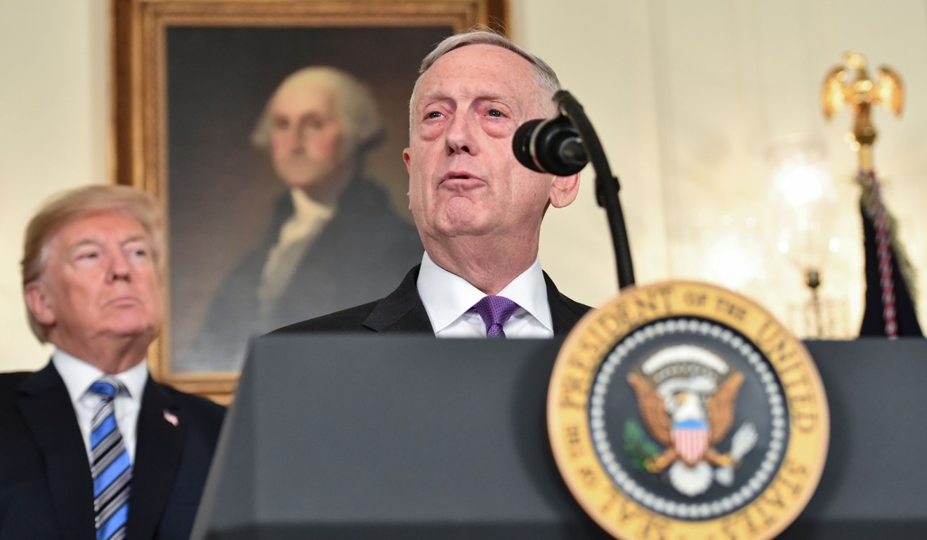 US President Donald Trump looks on as Secretary of Defense James Mattis speaks about the spending bill on Friday. Photo: AFP