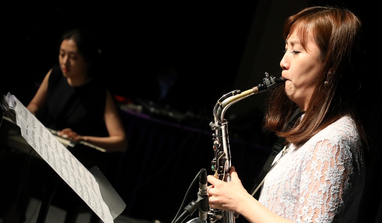 It was the idea of Zoe Ng (right), the group’s saxophonist, to gather the other two musicians together to form a group. Photo: Edward Wong