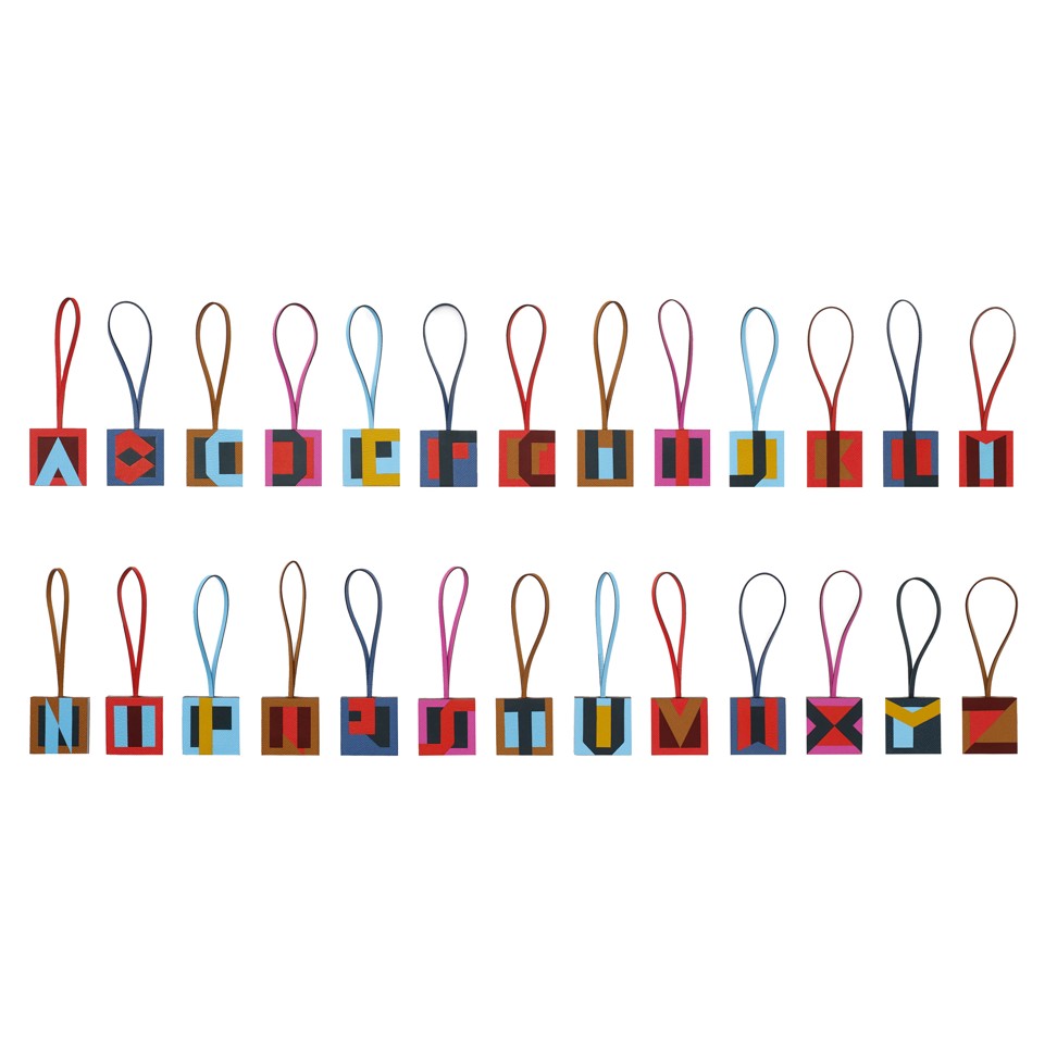 Lettres au carré bag charms showing the entire alphabet, in Epsom calfskin, Sombrero calfskin and Mysore goatskin 