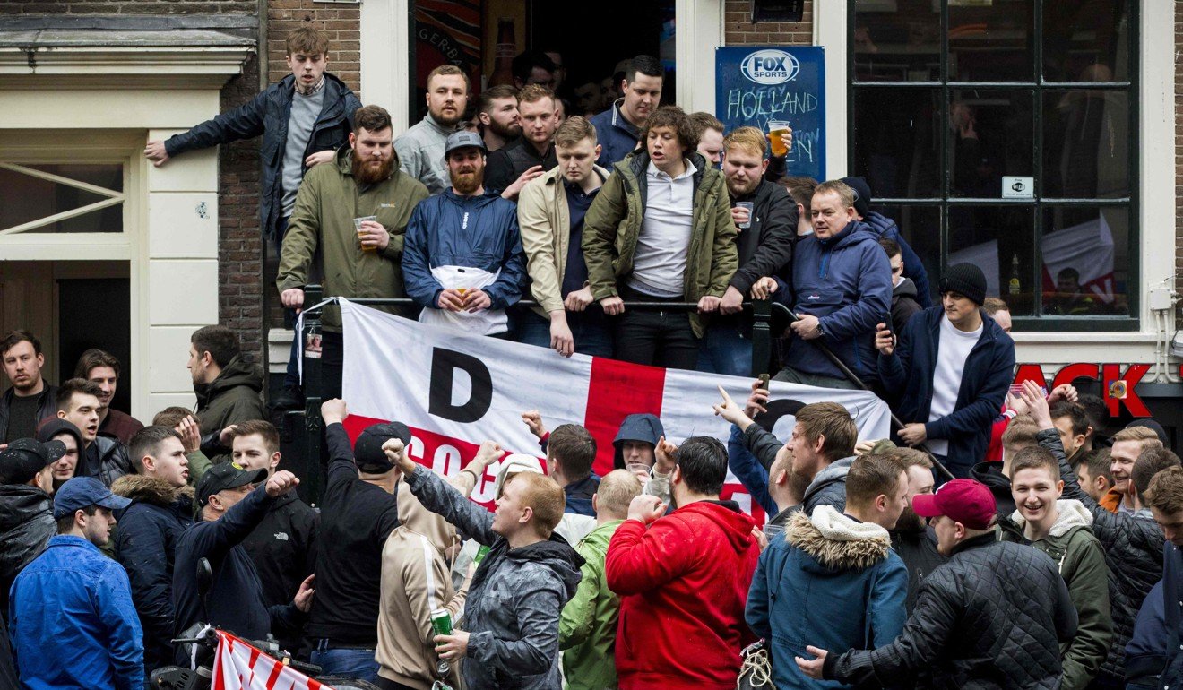 English football fans are gathered at the Amsterdam red-light district prior to the friendly match against Netherlands. Photo: AFP