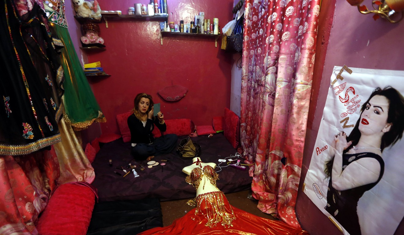Paro, a Pakistani transgender woman, is seen at her home in Peshawar, Pakistan on March 14. According to rights groups, transgender people are the most ostracised members of Pakistani society, and violence against them, often at the hands of those closest to them, is extremely high. Photo: EPA-EFE