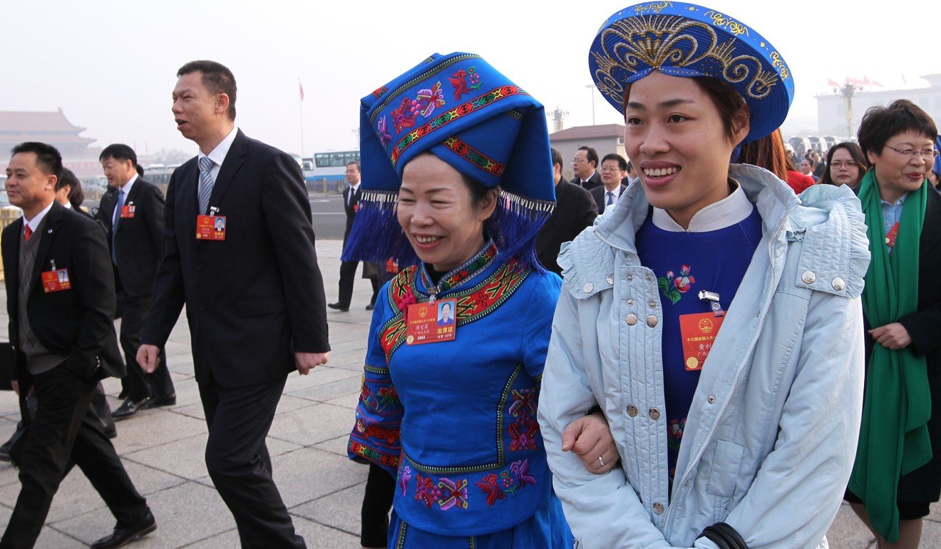 Ethnic minority delegates arriving for the National People’s Congress in Beijing, on March 13. Photo: Simon Song