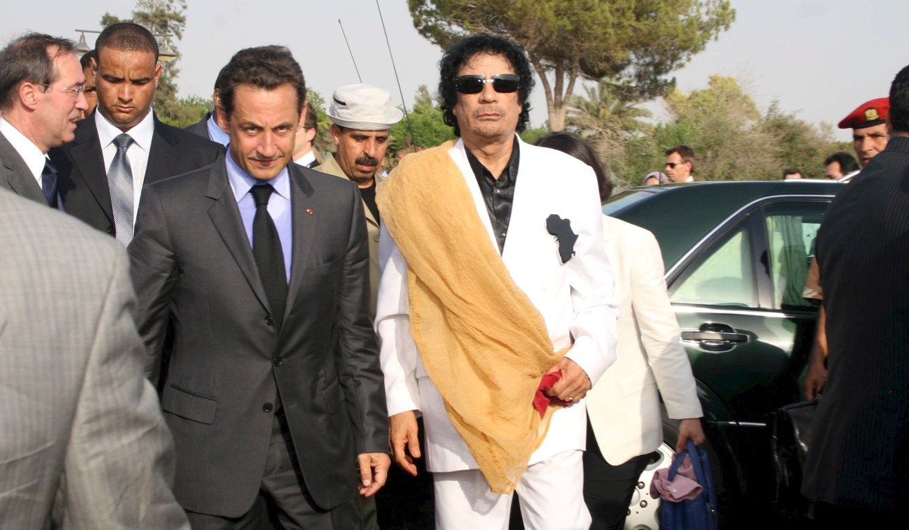 Libyan President Muammar Gaddafi and French President Nicolas Sarkozy arrive at Gaddafi’s Bab Azizia Palace in Tripoli, Libya, on July 25, 2007. Photo: EPA-EFE