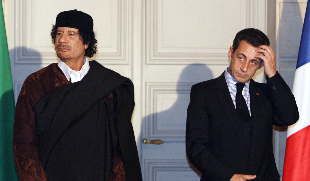 Sarkozy is seen with Gaddafi in December 2007. Photo: Pool via AFP