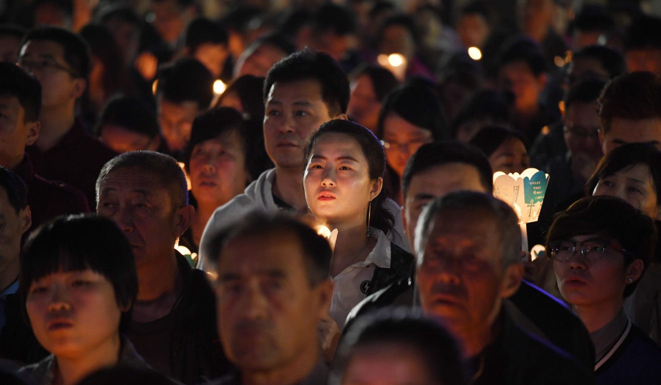 Catholic worshippers at an officially approved cathedral in Shanghai. The church has been split between its official and underground branches since 1951. Photo: AFP