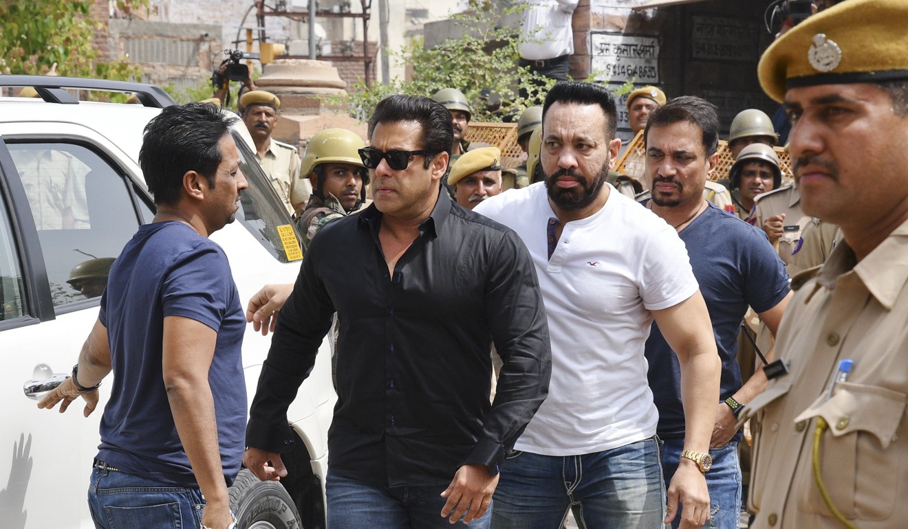 Bollywood star Salman Khan, second left, arrives at the court. Photo: AP