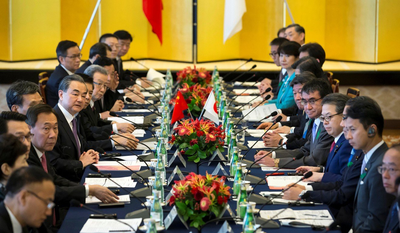 Chinese and Japanese delegations headed by their foreign ministers attend a high-level economic dialogue in Tokyo on Monday. Photo: Reuters