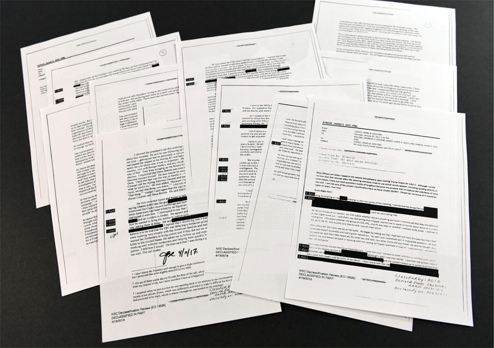 Copies of the memos written by former FBI director James Comey are displayed on April 19. The 15 pages contain new details about a series of interactions Comey had with Donald Trump in the weeks before his May 2017 firing. Those encounters include a White House dinner at which Comey says Trump asked him for his loyalty. Photo: AP 