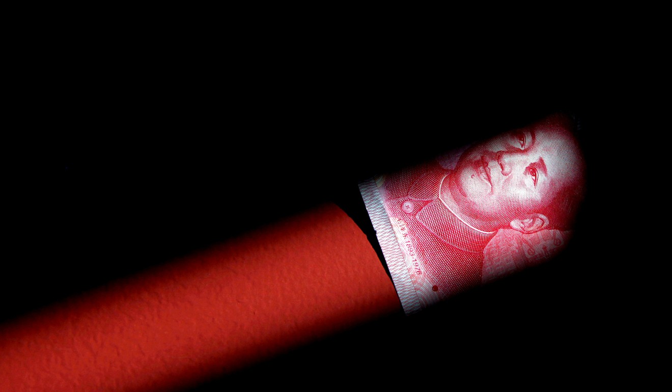 China’s National Audit Office found debt risks for governments in five provinces that had used various means to accumulate hidden liabilities. Pictured, a 100 yuan note. Photo: Reuters