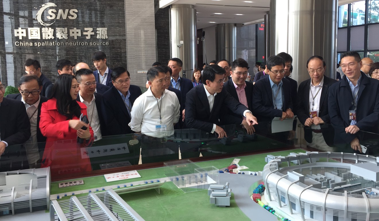 Lawmakers and government officials visiting the state-owned China Spallation Neutron Source centre in Dongguan city on Saturday. Photo: Tony Cheung