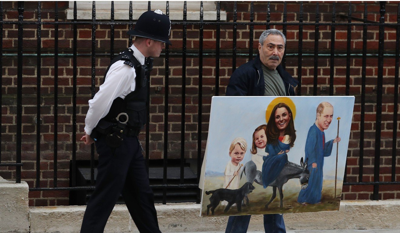 Political artist Kaya Mar (right) arrives at St Mary's Hospital in central London carrying a painting depicting Britain’s William and Kate in a religious context on April 23, 2018. Photo: AFP