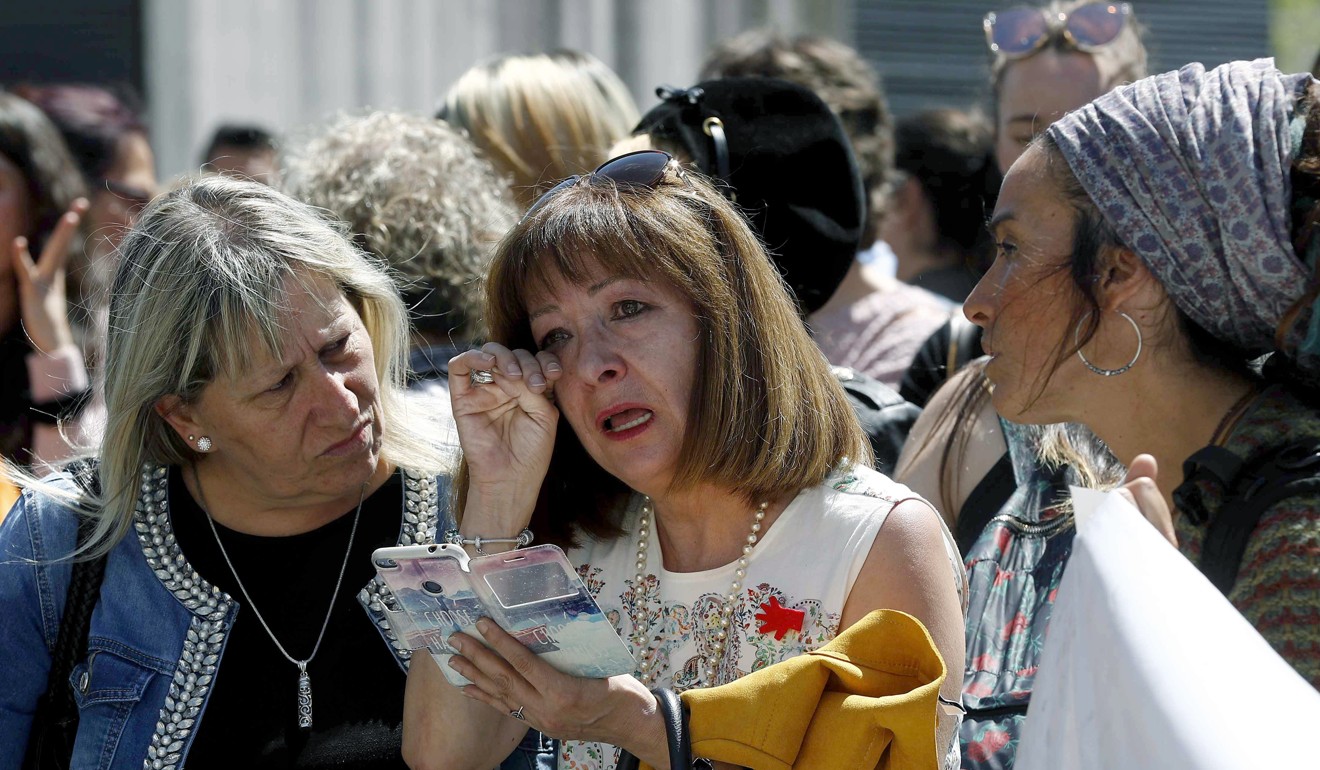 The sentencing of five men accused of gang rape during the San Fermin fiesta drew strong reactions from protesters at the Justice palace in Pamplona, Spain, on Thursday. Photo: EPA