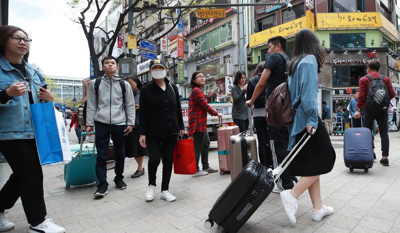 Chinese tourists pictured on Myeongdong Street in downtown Seoul last month. Photo: EPA-EFE