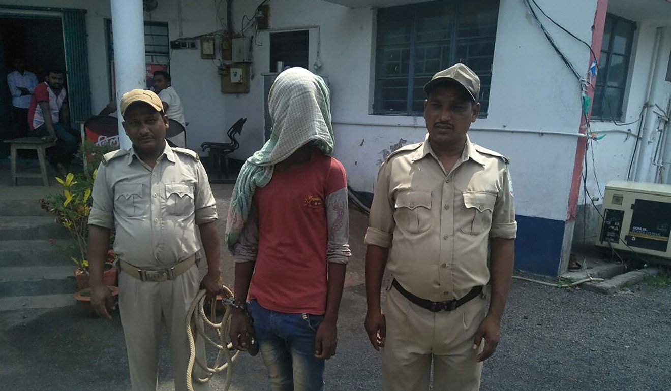 An alleged rapist held by Indian police in India's eastern Jharkhand state. Photo: AFP