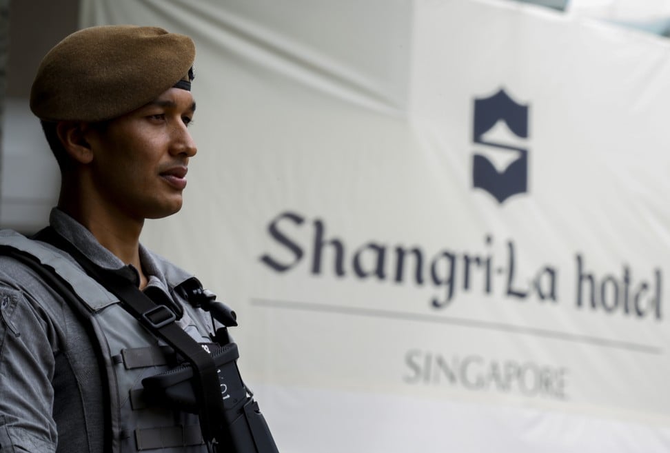 Armed security personnel stand guard at the front of the Shangri-La Hotel, Singapore in 2017. The venue has not yet been announced for the meeting of Donald Trump and Kim Jong-un, but the Shangri-La Hotel has been reported to be a possible summit location. Photo: EPA-EFE