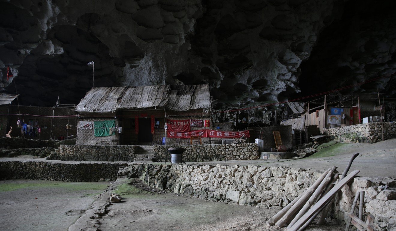 The cave shelters homes made of wood from extremes of cold, heat and rain. Photo: Lea Li