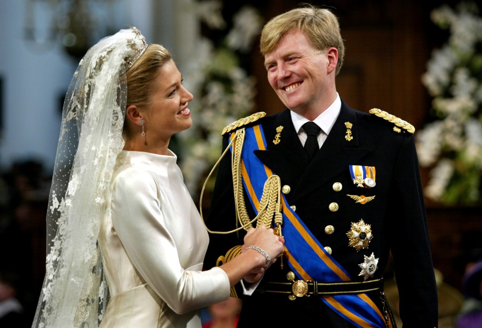 Princess Maxima smiles with Dutch Crown prince Willem-Alexander during their wedding at the Nieuwe Kerk in Amsterdam. Photo: Reuters