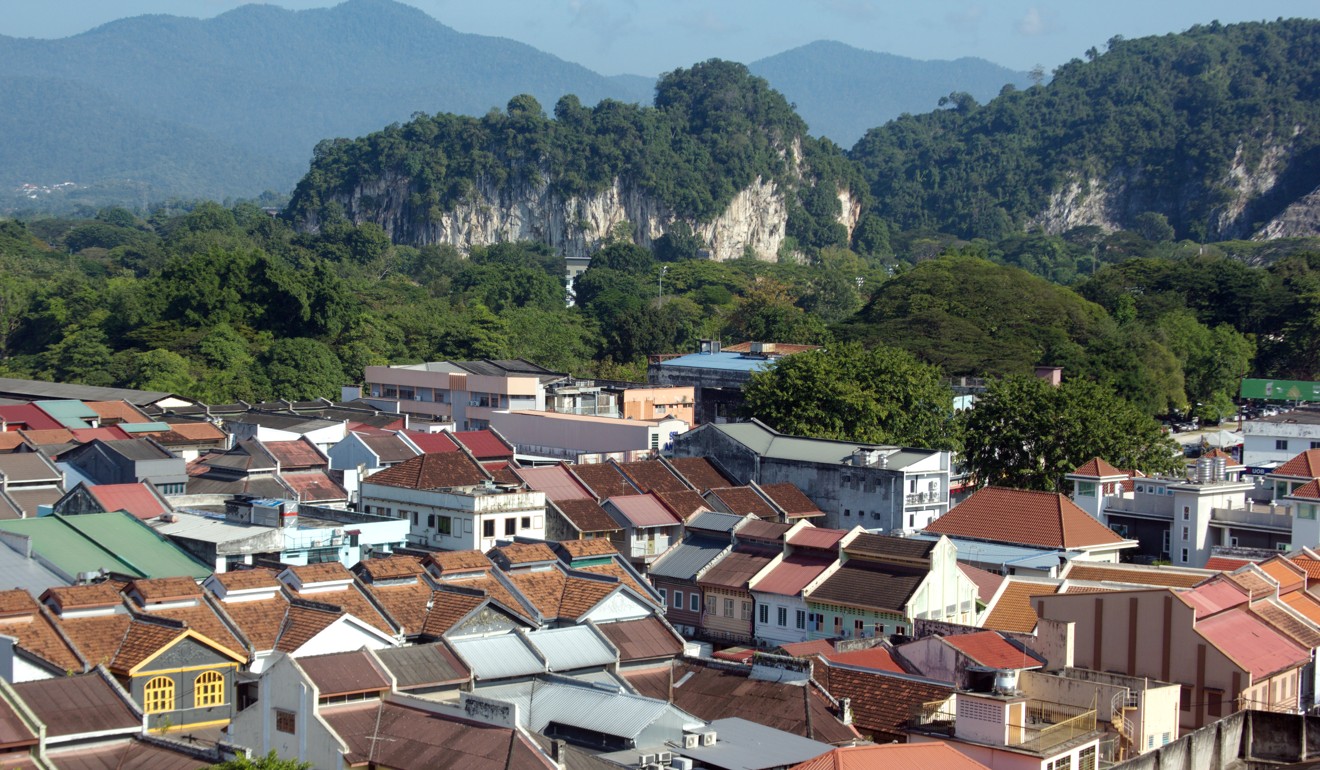 Low-rise Ipoh, surrounded by limestone mountains. Keith Mundy