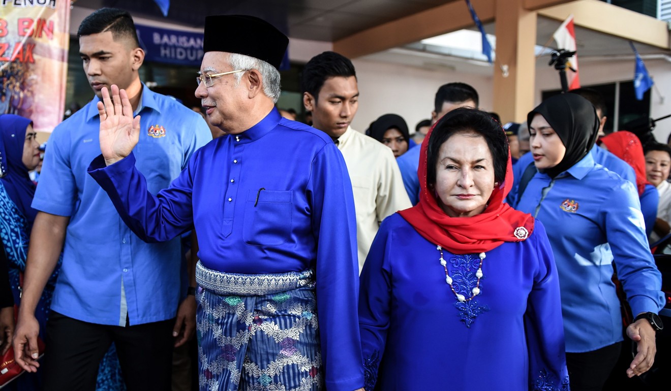 File photo of Najib and his wife Rosmah Mansor in Pekan. Photo: AFP