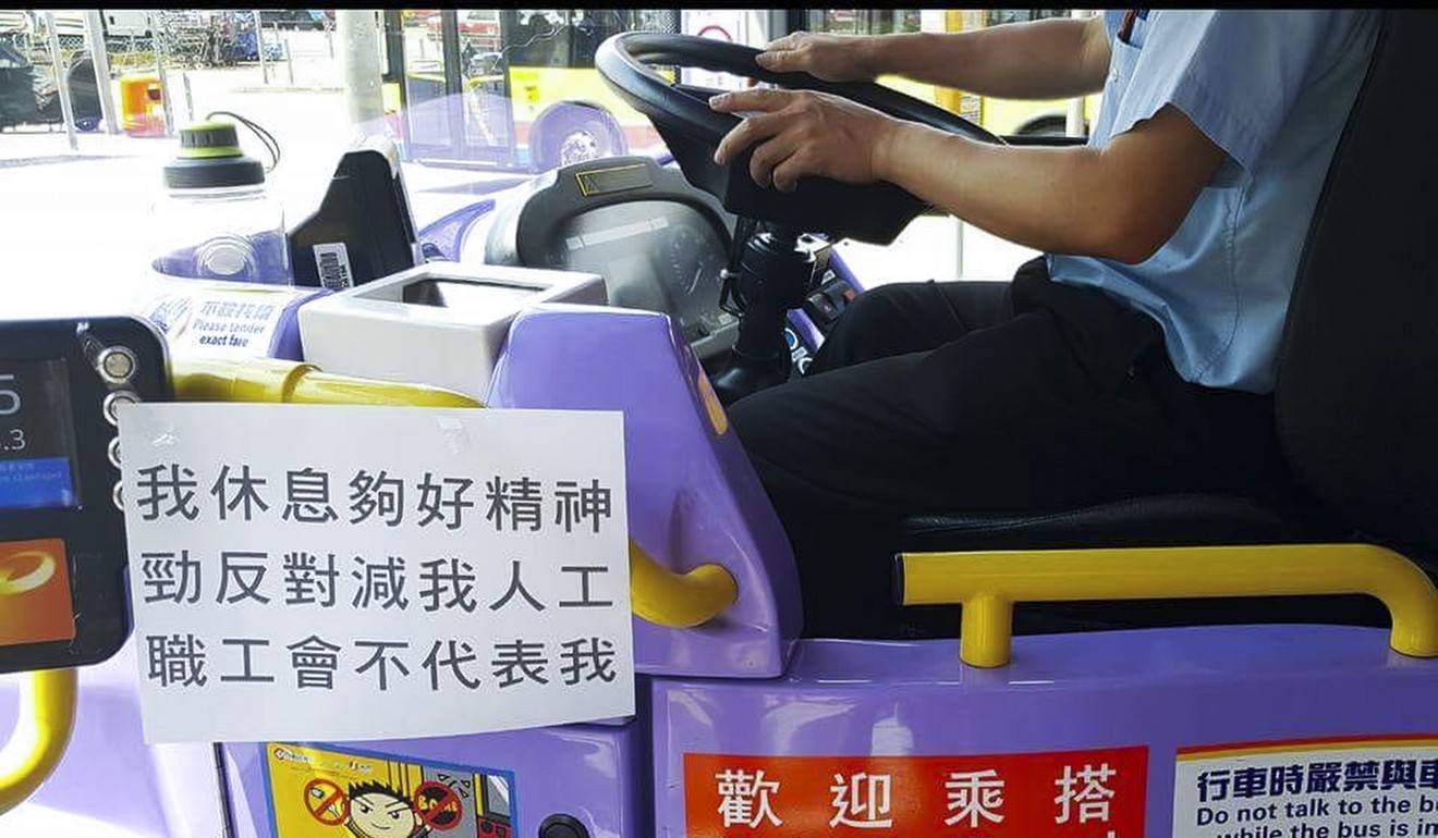 One New World First Bus driver put a notice on his cab saying: “I have had enough rest and am wide-awake. I oppose a great reduction of my salary. The federation does not represent me.” Photo: Handout