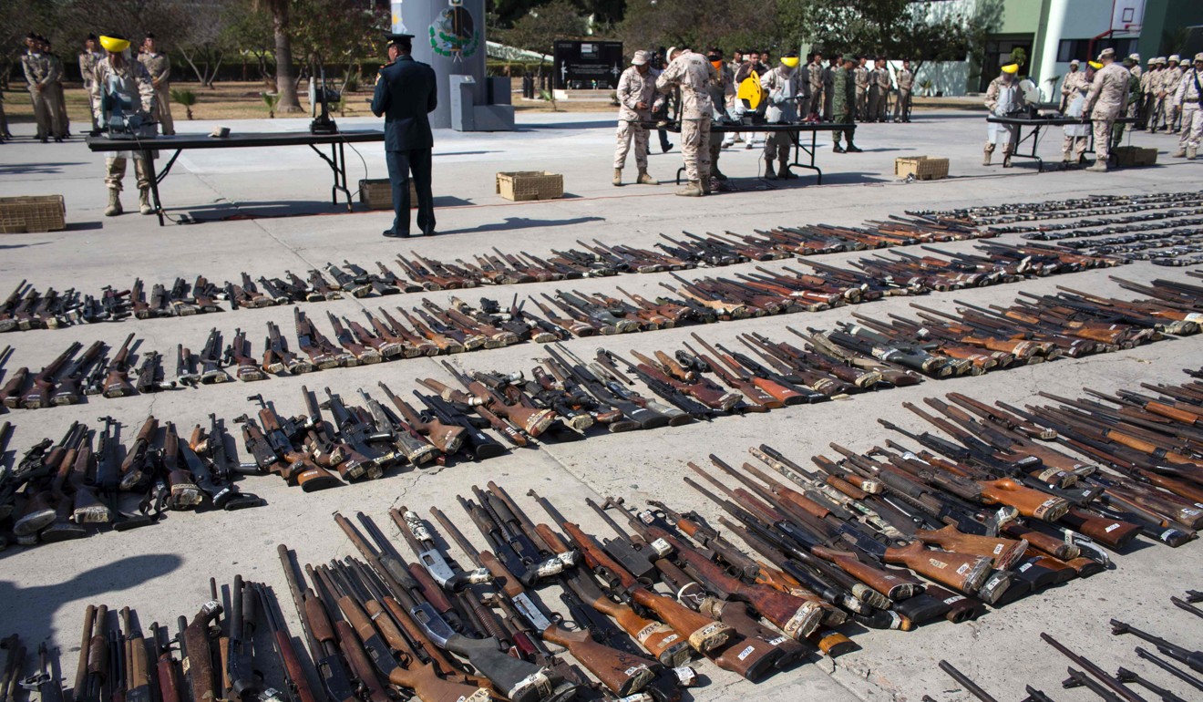 Hundreds of firearms before being destroyed at the Morelos military headquarters in Tijuana. File photo: AFP