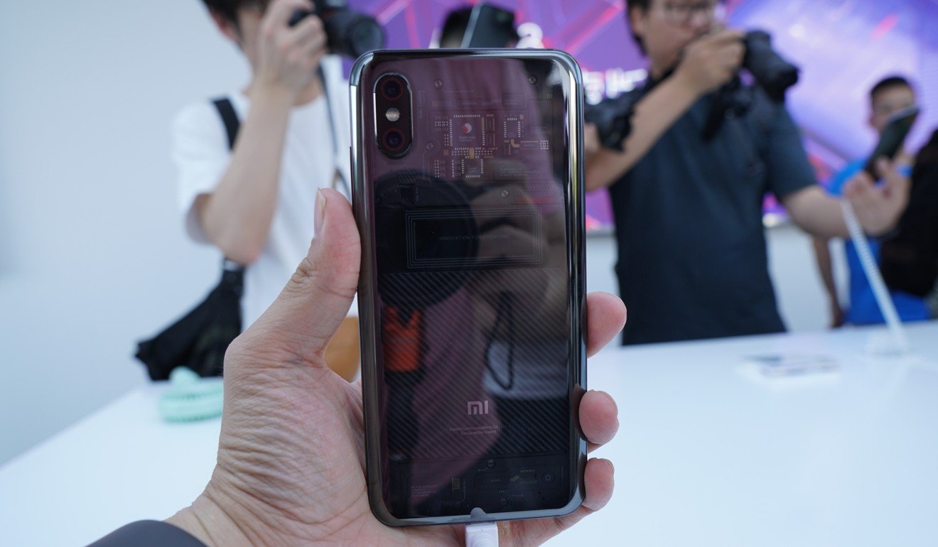 Xiaomi's Mi 8 has dual 12-megapixel rear-facing cameras. The main lens has an f/1.8 aperture. Its Explorer Edition has a transparent glass back. Photo: Ben Sin