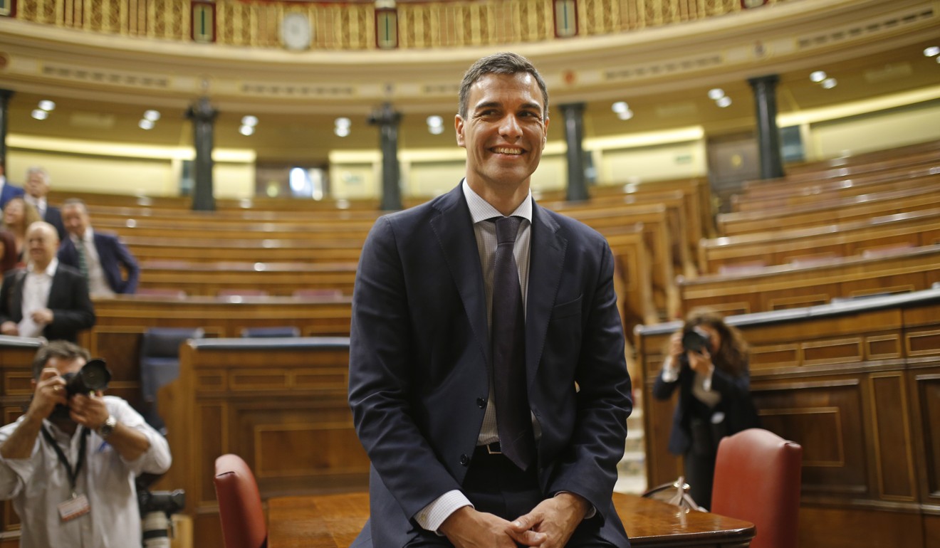 Socialist leader Pedro Sanchez poses in the parliament after a motion of no confidence vote at the Spanish parliament in Madrid. Photo: AP