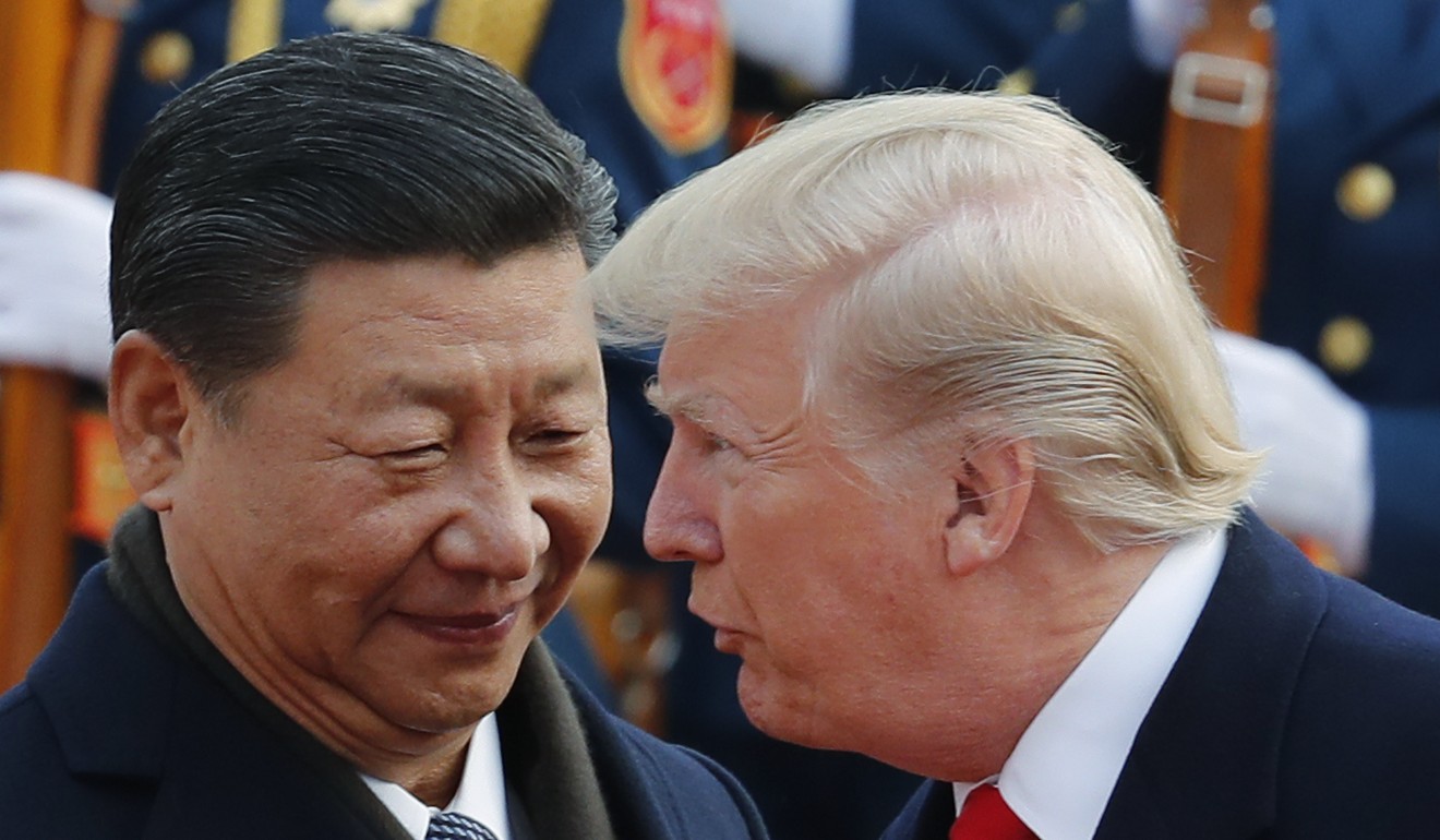 Chinese President Xi Jinping listens to US President Donald Trump (right) during a welcome ceremony at the Great Hall of the People in Beijing in November 2017. Photo: AP