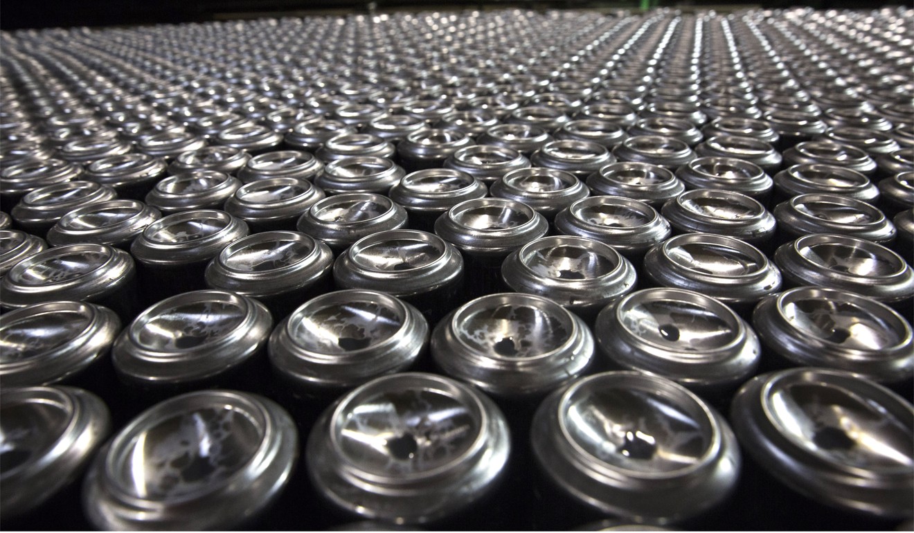 Aluminium cans pass on the production line at the Ball Packaging Europe plant, in Belgrade, Serbia. Photo: Bloomberg